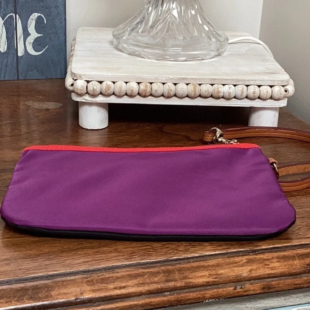 Dooney & Bourke black, red and purple nylon clutch, wristlet, zipper pouch